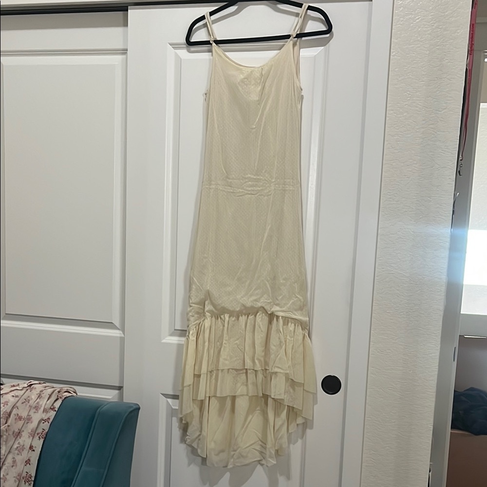 Elegant Cream Sleeveless Dress

Adjustable straps - Joyfolie